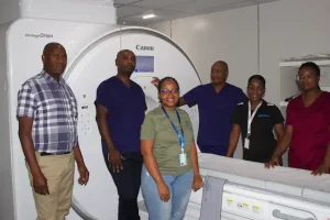 Lenmed Bokamoso Private Hospital staff standing alongside the new Aquilion Prime SP CT Scanner