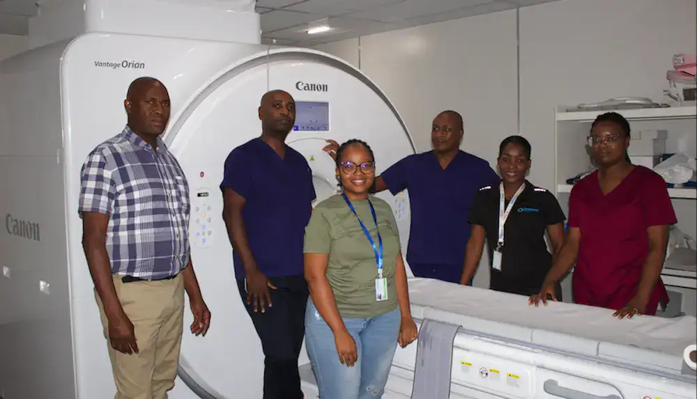 Lenmed Bokamoso Private Hospital staff standing alongside the new Aquilion Prime SP CT Scanner