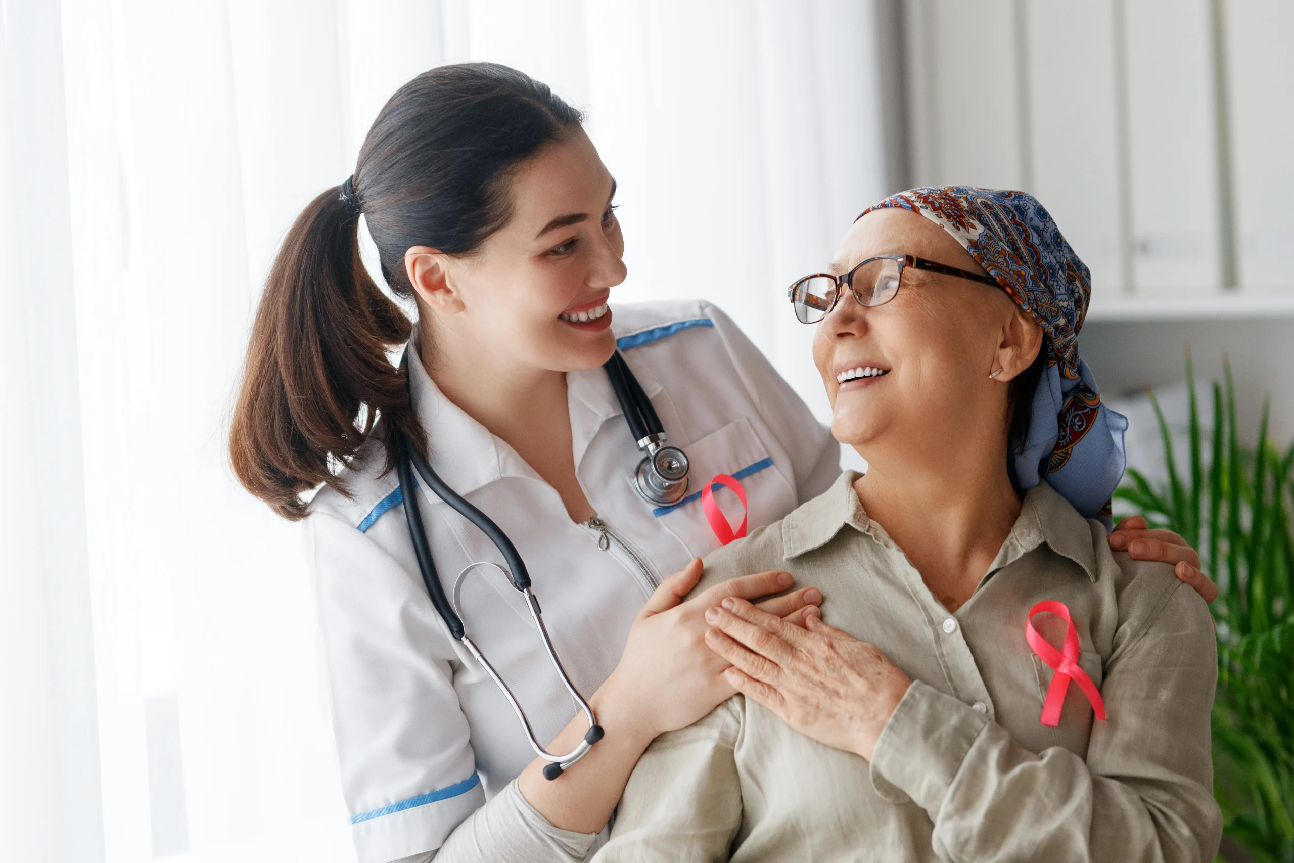 Breast cancer patient and doctor talking during consultation