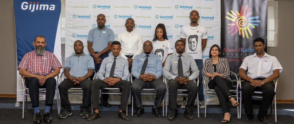 Lenmed team along with Gijima and the Ahmed Kathrada Foundation standing together for a photo