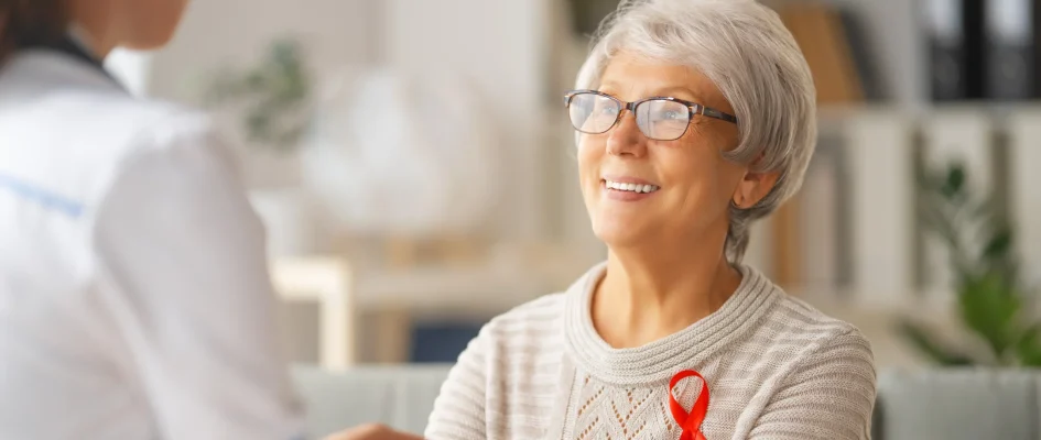 Elderly woman listening to doctor during consultation