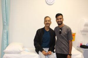 Father and son who celebrate successful kidney transplant