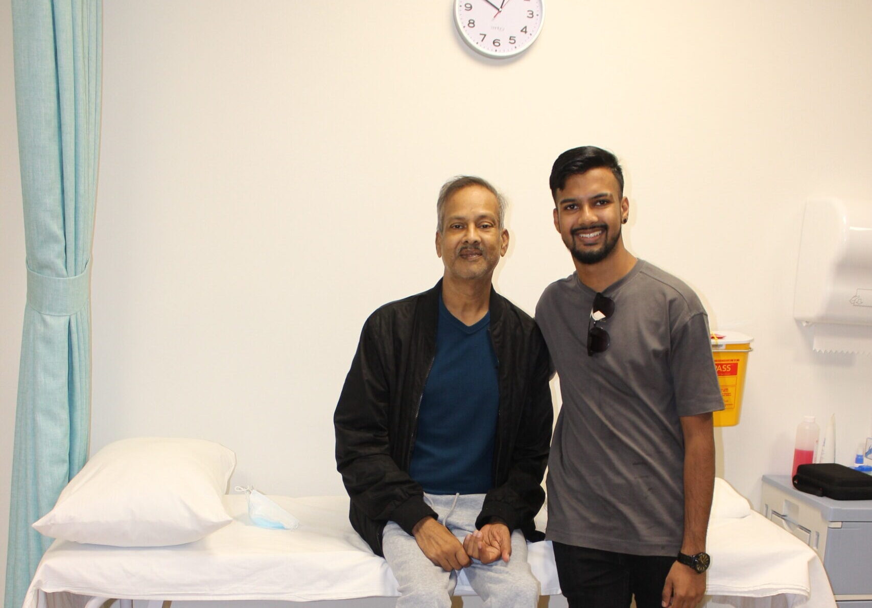 Father and son who celebrate successful kidney transplant