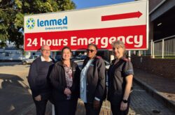 Wilmed hospital staff infront of hospital