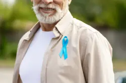 senior man wearing blue-ribbon for prostate cancer senior man wearing blue-ribbon for prostate cancer