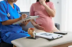 pregnant-mothers-meet-the-nurse-at-the-clinic-as-s-2026-01-08-07-51-57-utc_compressed Pregnant woman at gynaecologist