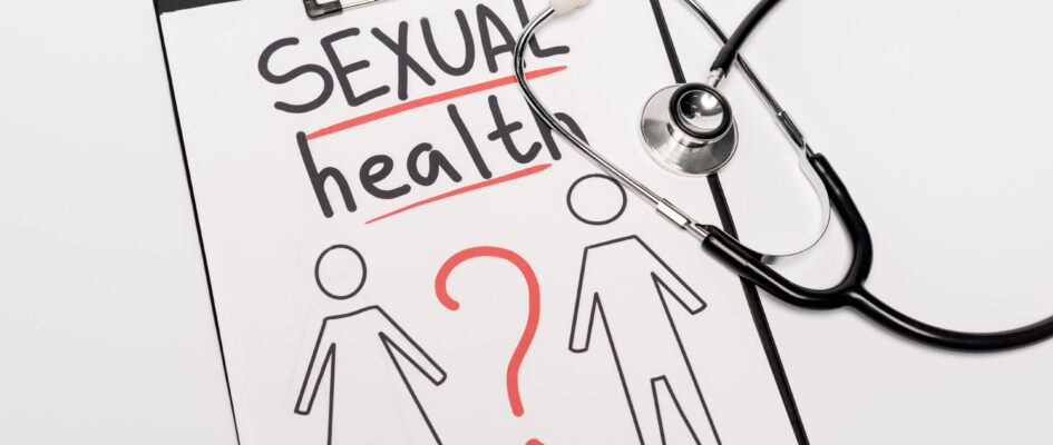 top view of clipboard with sexual health lettering, drawn man and woman near stethoscope isolated on top view of clipboard with sexual health lettering, drawn man and woman near stethoscope isolated on