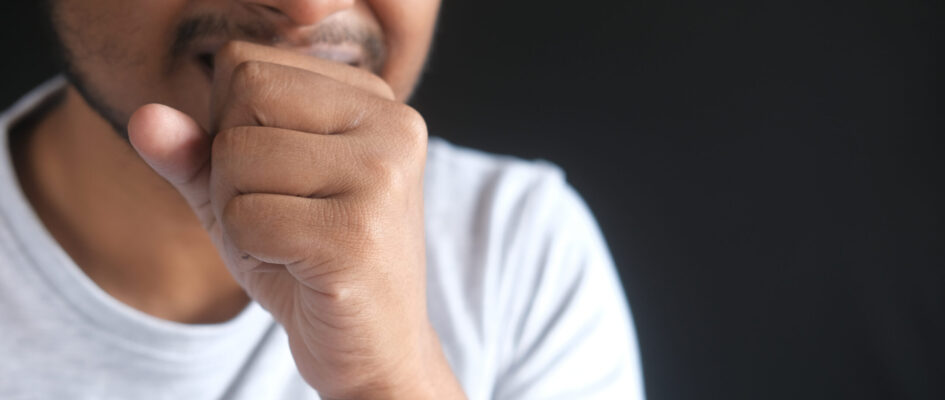 Sick man got flu allergy sneezing and blowing nose