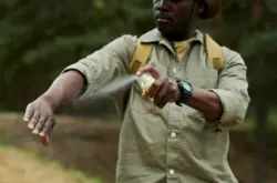 man-using-mosquito-spray-outdoors-2026-01-08-00-24-18-utc (1)_compressed man using mosquito spray outdoors. Malaria