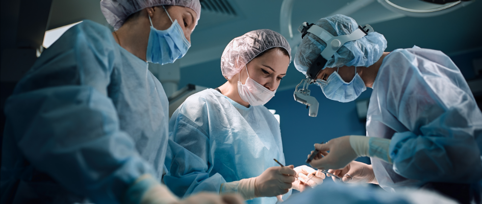 surgeons performing spinal surgery