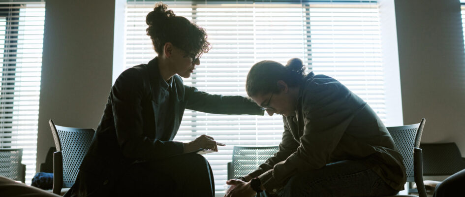 compassionate-woman-supporting-distressed-person