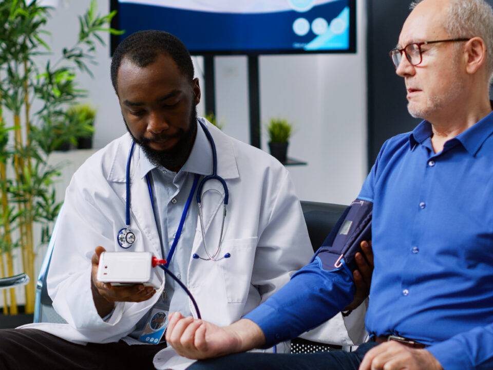 doctor-checks-senior-patient-s-blood-pressure