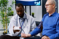 doctor-checks-senior-patient-s-blood-pressure