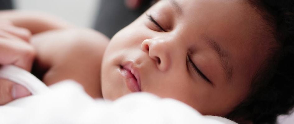 african baby sleeping