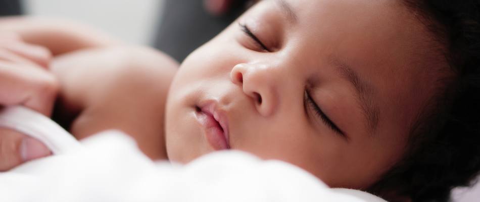 african baby sleeping