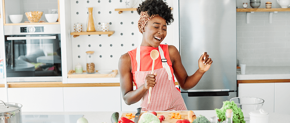 woman singing in the kitchen