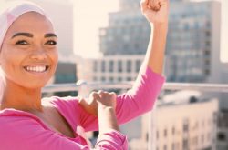 muslim woman holding her left bicep