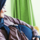 muslim pregnant woman observing belly