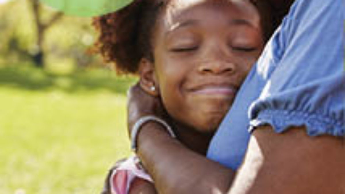 atrial fibrillation with woman and daughter hugging as a background