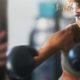 African woman punching a punch bag