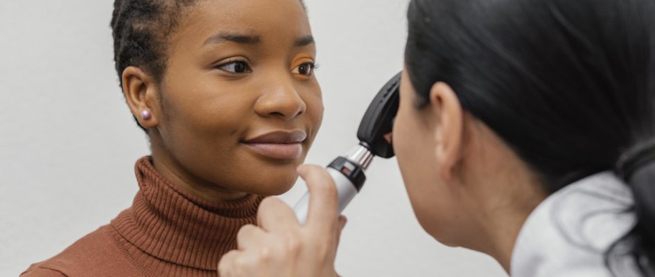 close up doctor checking patient eye