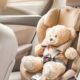teddy bear in child car seat
