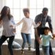 African family dancing in their living room