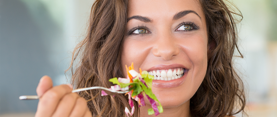 woman eating healthy salad