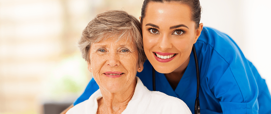 portrait of nurse and patient smiling