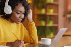 woman studying with headphones on